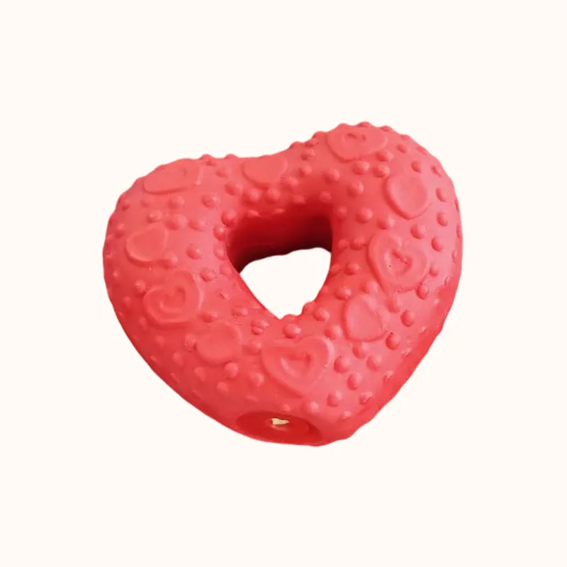 Red heart-shaped dog chew ring