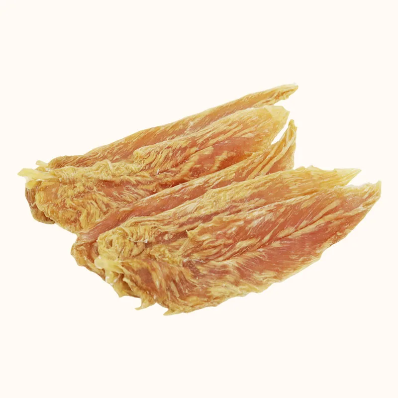 Golden Chicken Jerky Whole dog treats with broad tapered shapes and visible fibers