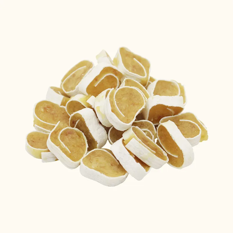 Sliced Chicken Sushi dog treats with golden centers and white outer rings
